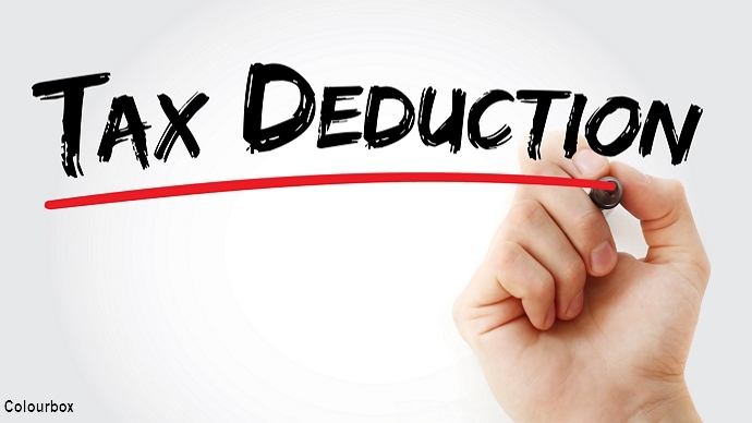 "Tax Deduction" written on a white board; illustration photo: colourbox.com