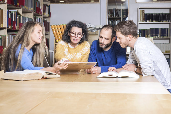 group of colleagues discussing