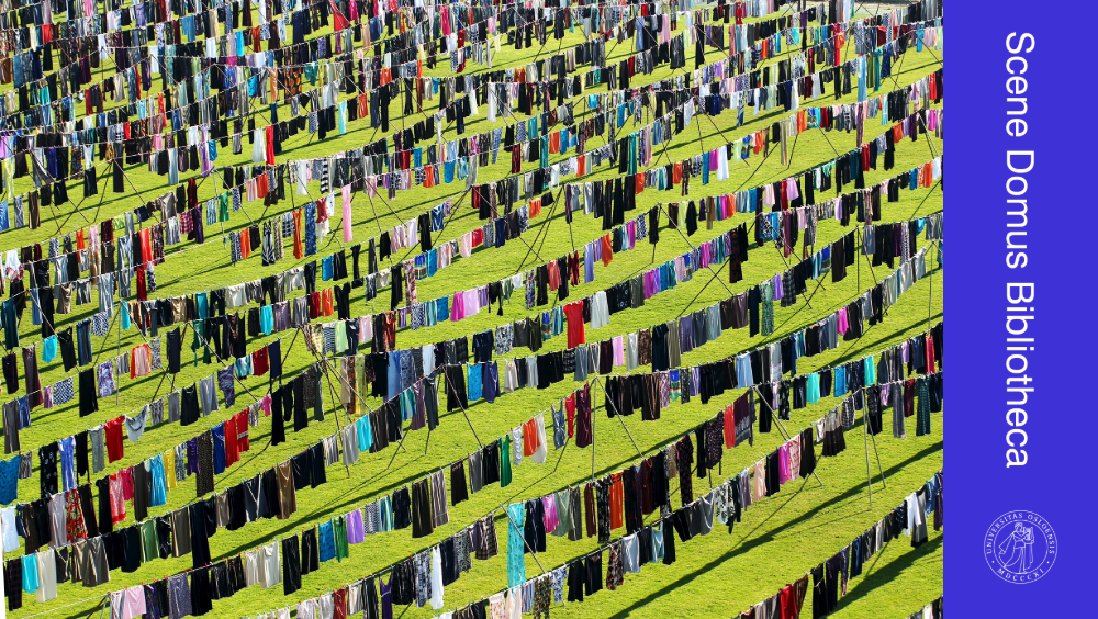 Photo of the art installation "Thinking of You" by Alketa Xhafa-Mripa, showing rows of skirts on clothes lines at a footbal stadium in Kosovo.