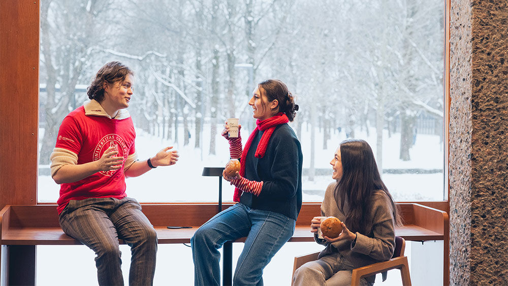 Three students talking