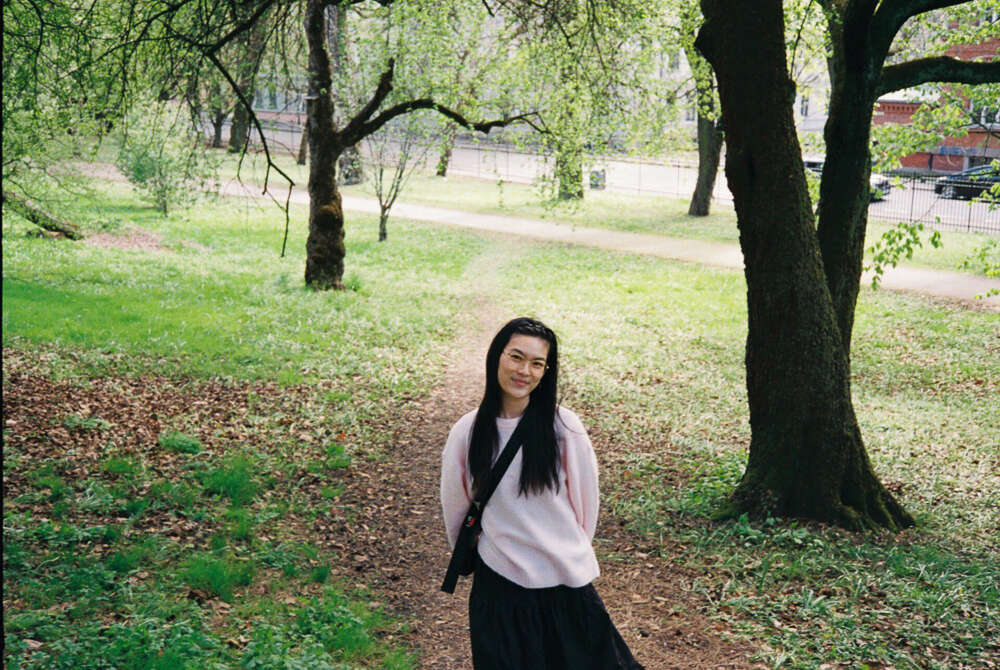Rebecca Nguyen in a park.