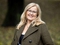 photo of Anne Cathrine smiling - she has shoulder length blond hair and glasses