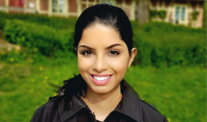 Image may contain: Person, Hair, Hairstyle, Smile, Black hair.