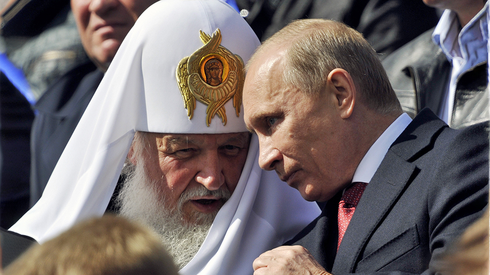 Patriark Kiril og Vladimir Putin.