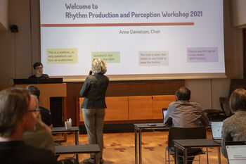 Furniture ,Table ,Chair ,Projection screen ,Public speaking.