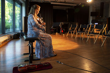 Furniture ,Window ,Chair ,Flooring ,Musician.