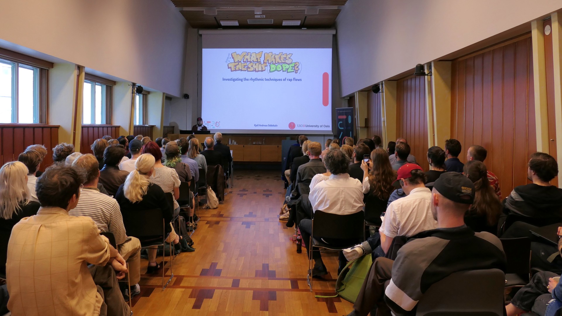 People in Forsamlingssalen attending a public defence