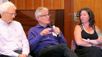 Glasses ,Microphone ,Chair ,Social group ,People.