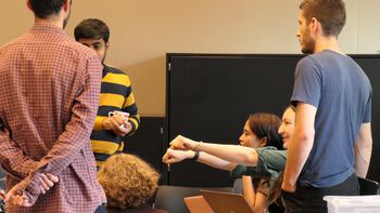 Gesture ,Chair ,T-shirt ,Hearing ,Sharing.