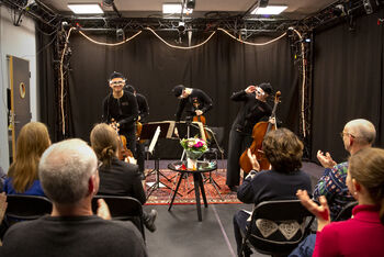 Outerwear ,Curtain ,Drum ,Musician ,Entertainment.