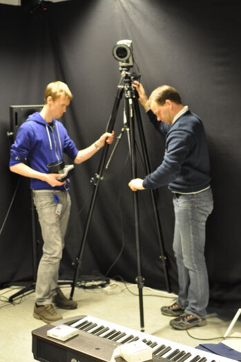 Jeans ,Public address system ,Entertainment ,Tripod ,Audio equipment.
