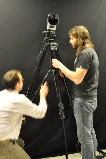 Trousers ,Tripod ,Videographer ,Camera lens ,Musician.