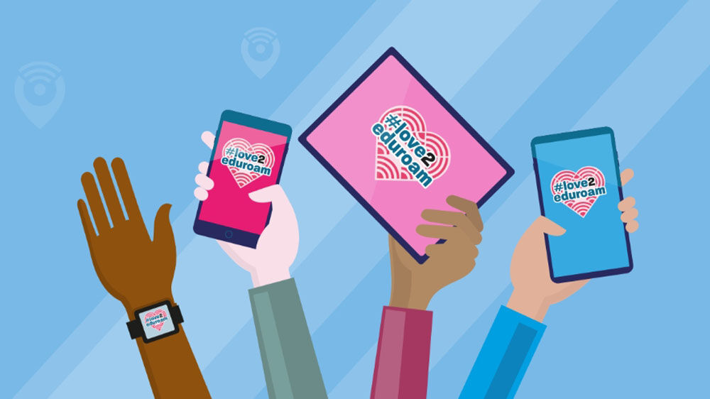 Colorful illustration of hands holding up phones and tablets with "eduroam" and "love to eduroam" on the screens.