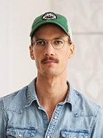 Man with glasses and a cap